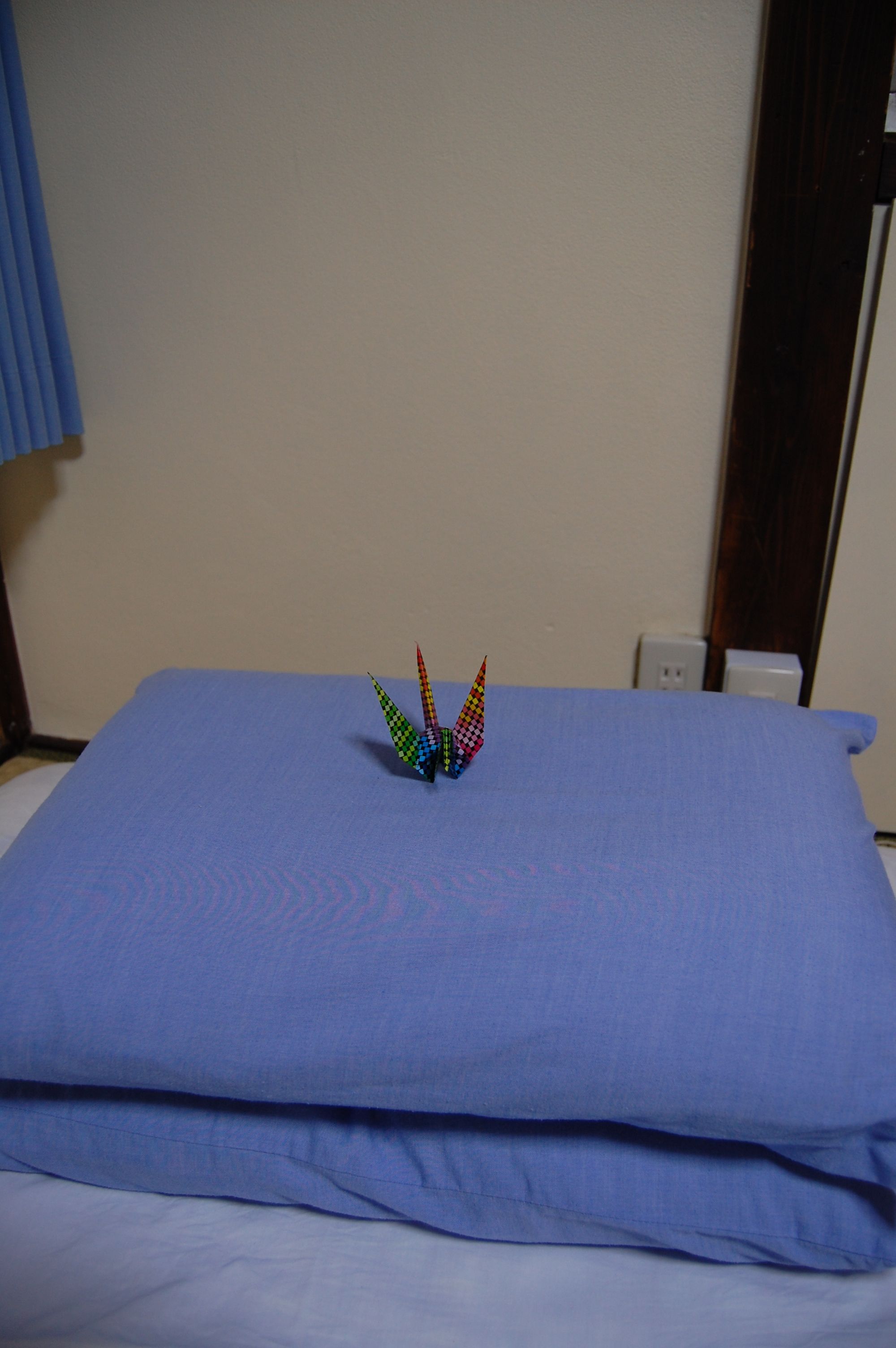 World Friendship Center, origami on pillow